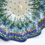 Close-up of spiral rim border on Whispering Ferns wave bowl