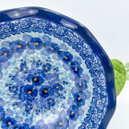 Close-up of scalloped rim and interior pattern on Deep Winter scalloped bowl