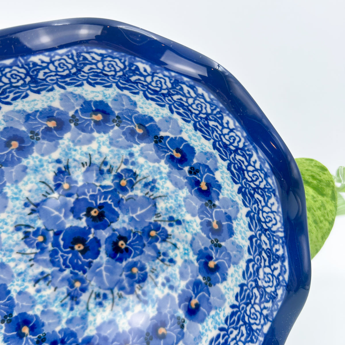 Close-up of scalloped rim and interior pattern on Deep Winter scalloped bowl