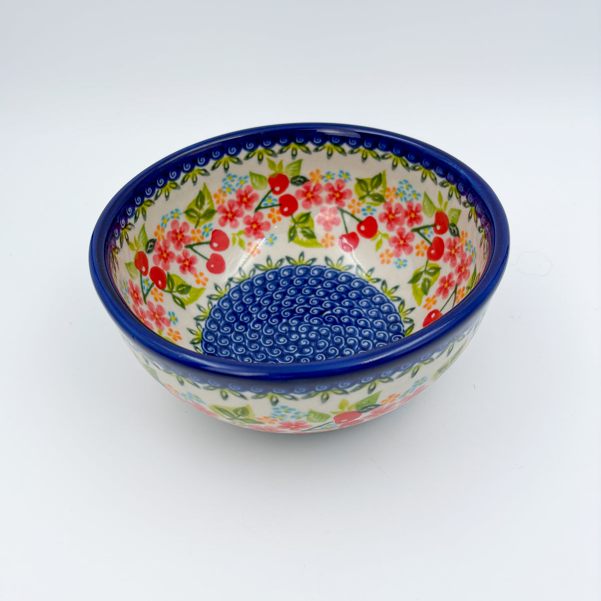 Cherry Blossom bowl, angled view showing interior and dotted swirl center