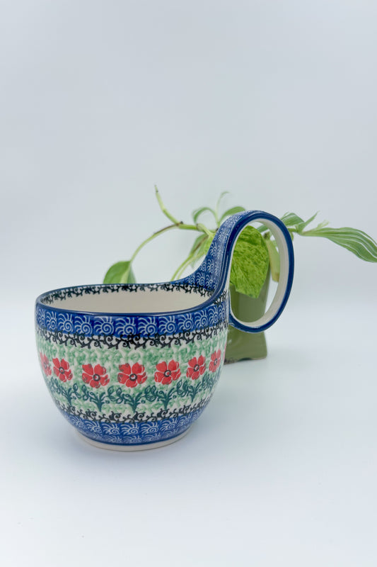 Polish pottery 16oz bowl with loop handle in the UNIKAT Candy Red Poppy pattern. It holds 16 oz of fluid.
Ceramika Artystyczna Company