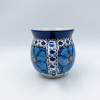 Back view of Cobalt Poppies bubble mug showing handle