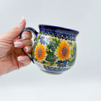 Fall Sunflower bubble mug held in hand, front view