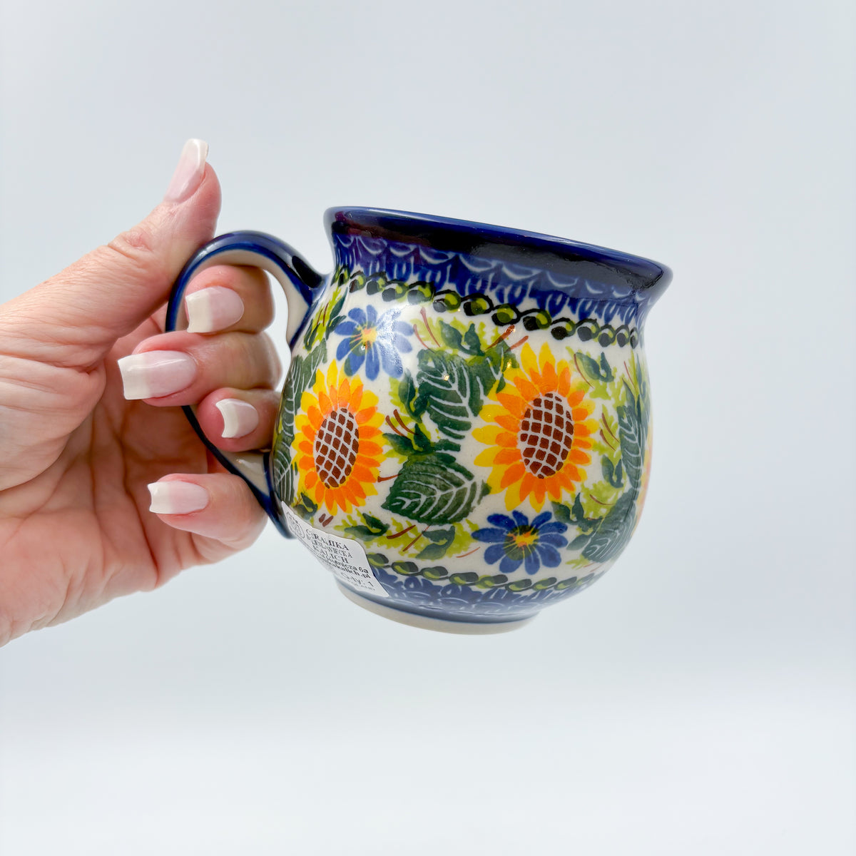 Fall Sunflower bubble mug held in hand, front view