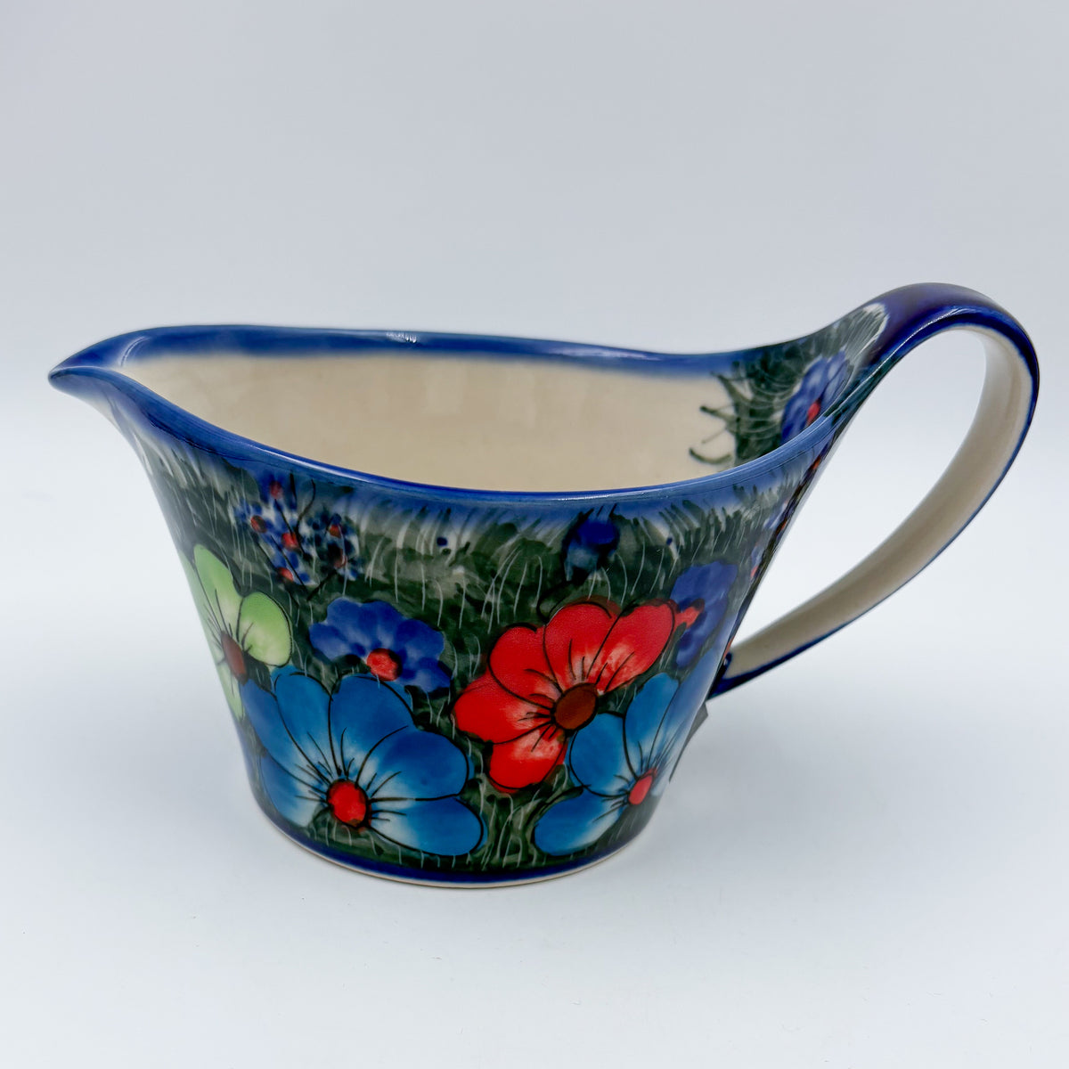 12 oz Loop Handle Gravy Boat.  Hand painted Polish pottery stoneware.  UNIKAT Forget Me Not Pansy