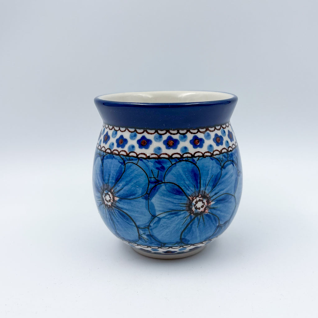 Cobalt Poppies bubble mug on white background, straight-on front view