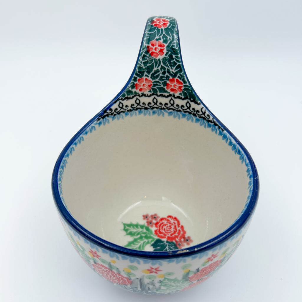 Polish pottery 16oz bowl with loop handle in the UNIKAT Robbin's Meadow pattern. 16 ounces of fluid.
6.26" x 4.49" x 5.51"
Ceramika Artystyczna Company