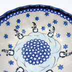 Snowman Penguins Design shell bowl, close-up top view of snowman figures and snowflake pattern