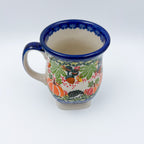 Hedgehog and Pumpkins tulip mug, angled top view