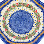 Mushroom Design wavy bowl, top-down close-up of mushroom wreath and blue dotted center detail
