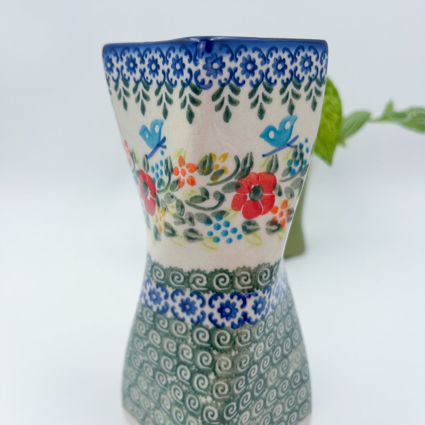 7” floral blue vase is a handmade by talented Polish artisans  Dimensions 6.73" x 2.48"
Ceramika Bona Company