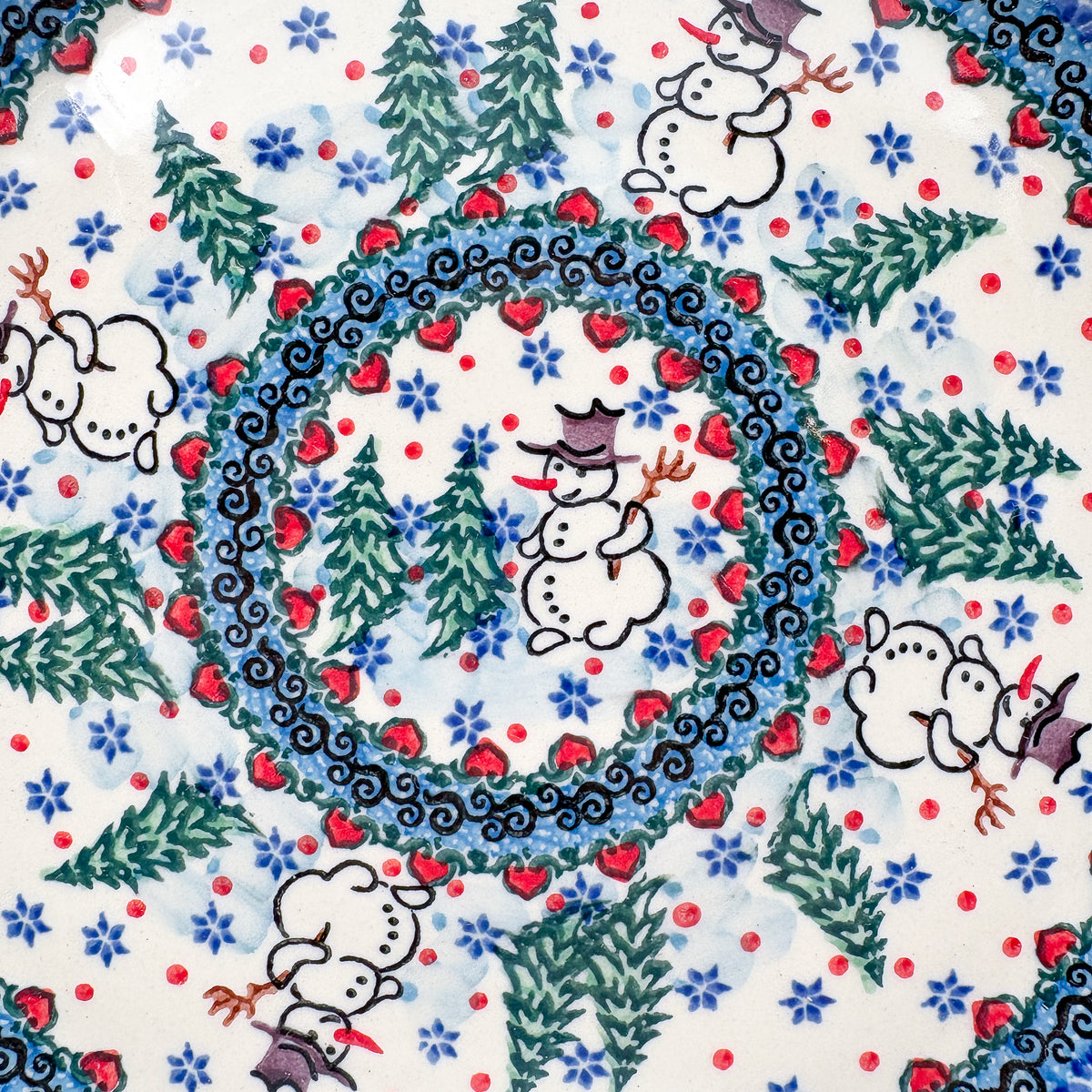 9” Plate.  Hand crafted Polish pottery stoneware: UNIKAT Dancing Snowman