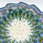 Close-up of scalloped rim and fern pattern on Whispering Ferns wave bowl