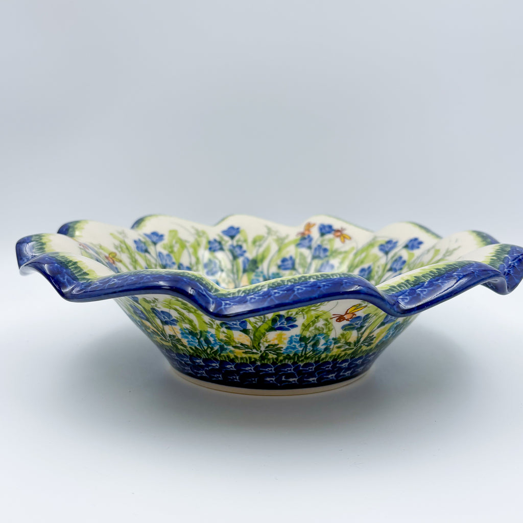Bluebell Meadow wave bowl on white background, angled front view