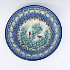 Gracious Gonolek stacking bowl, top-down view showing bullfinch birds and blue floral pattern