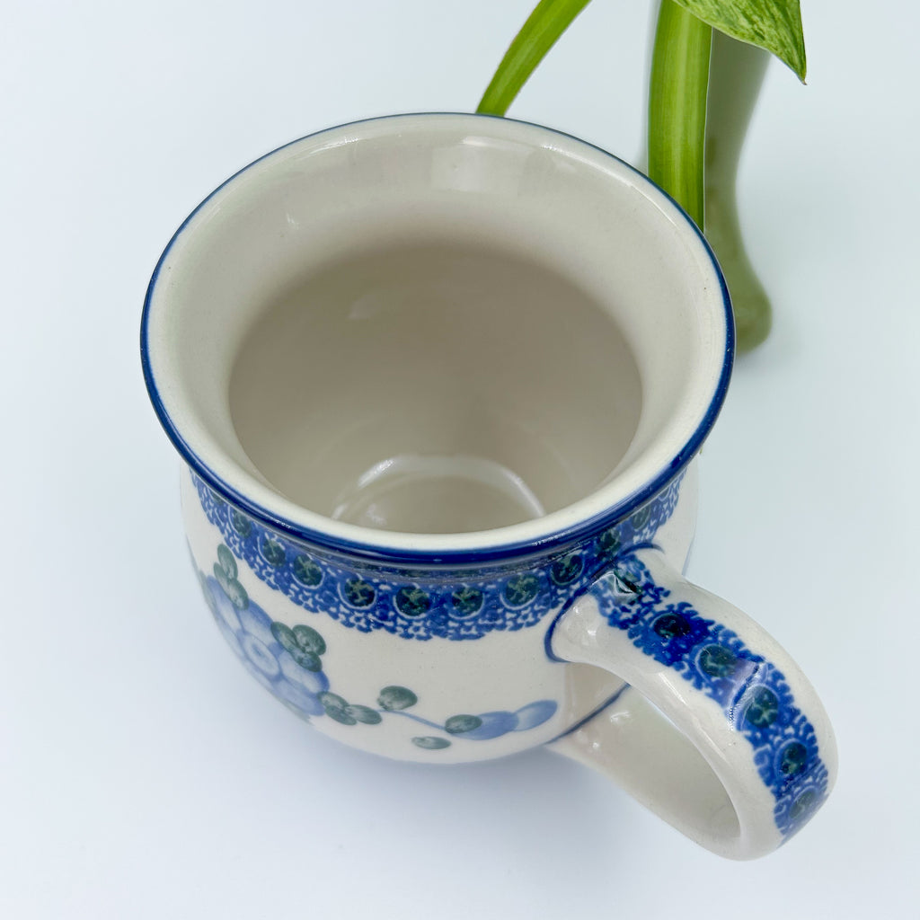This 12 oz Polish Pottery ceramic floral bubble mugolds 12 ounces of fluid.
Ceramika Artystyczna Company
