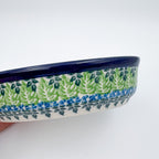 Close-up of green leaf rim pattern on Lime Bouquet oval bowl