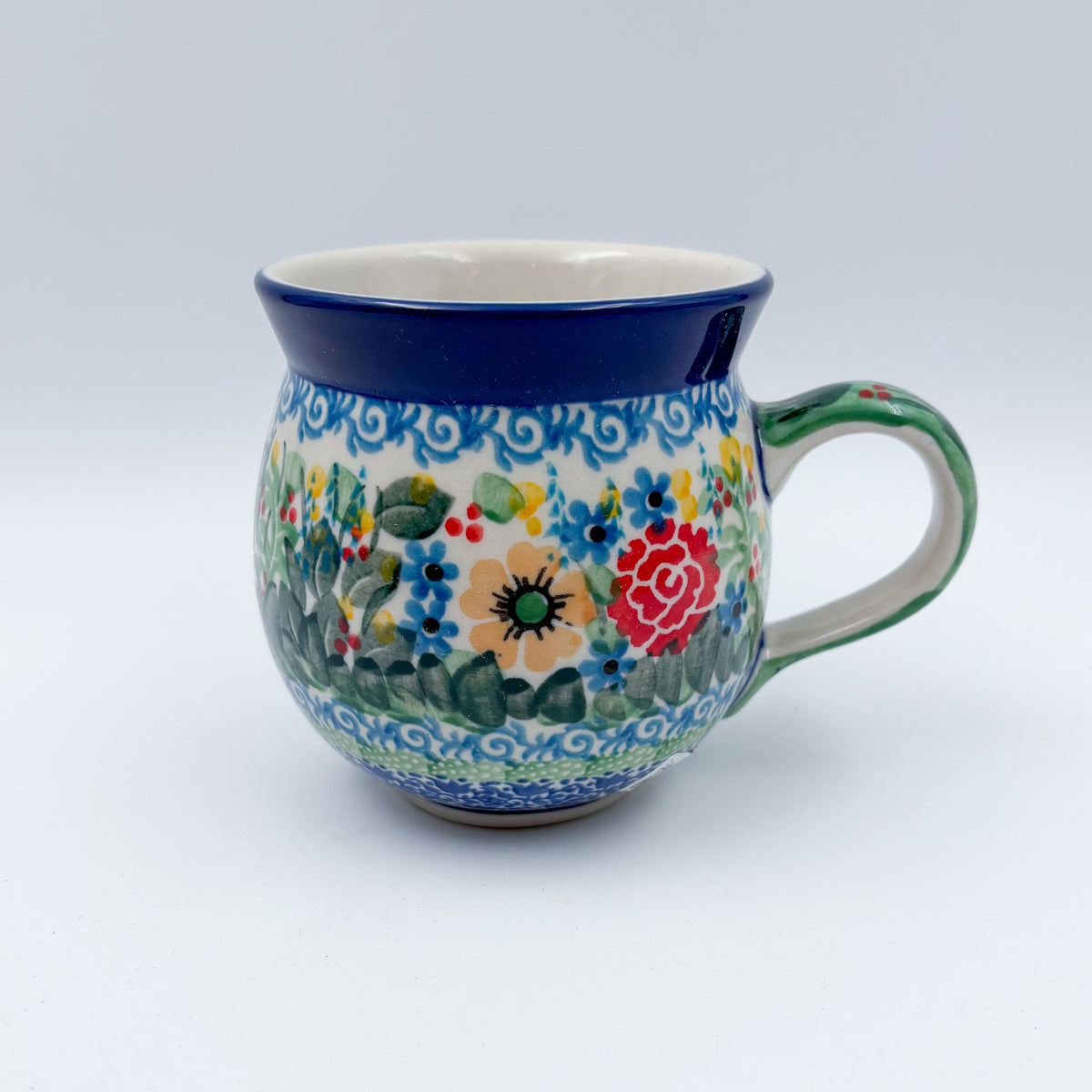 Butterfly Garden bubble mug on white background, angled front view