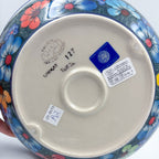 Bottom of Forget Me Not Pansy handled bowl showing Kalich Unikat stamp and artist signature