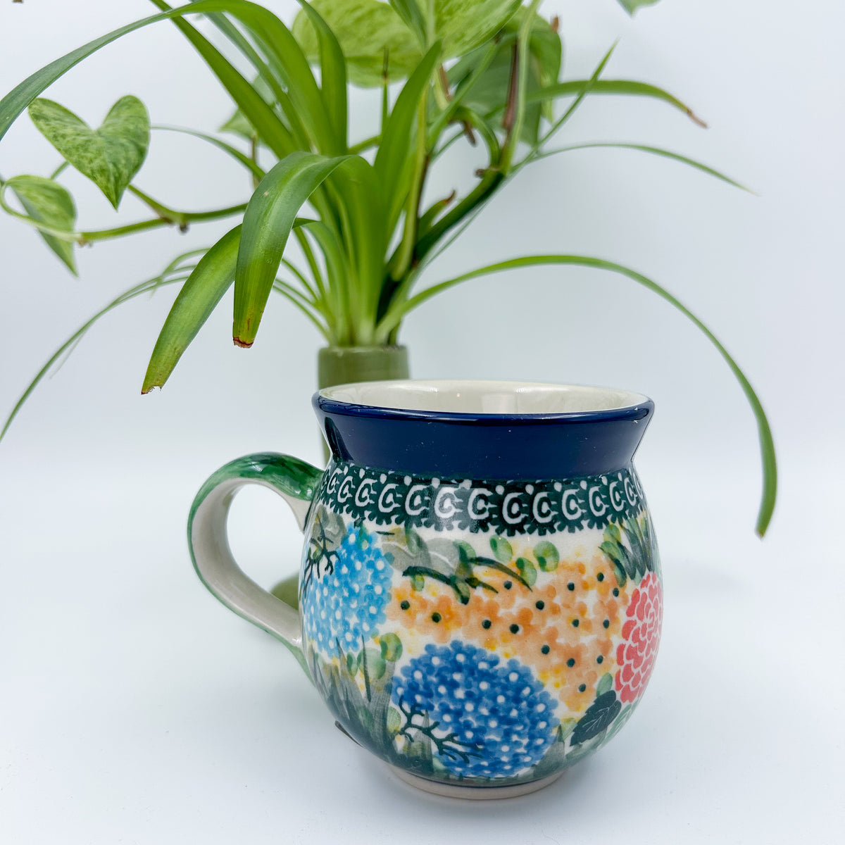Spring Garden bubble mug on white background, front view showing hydrangea pattern