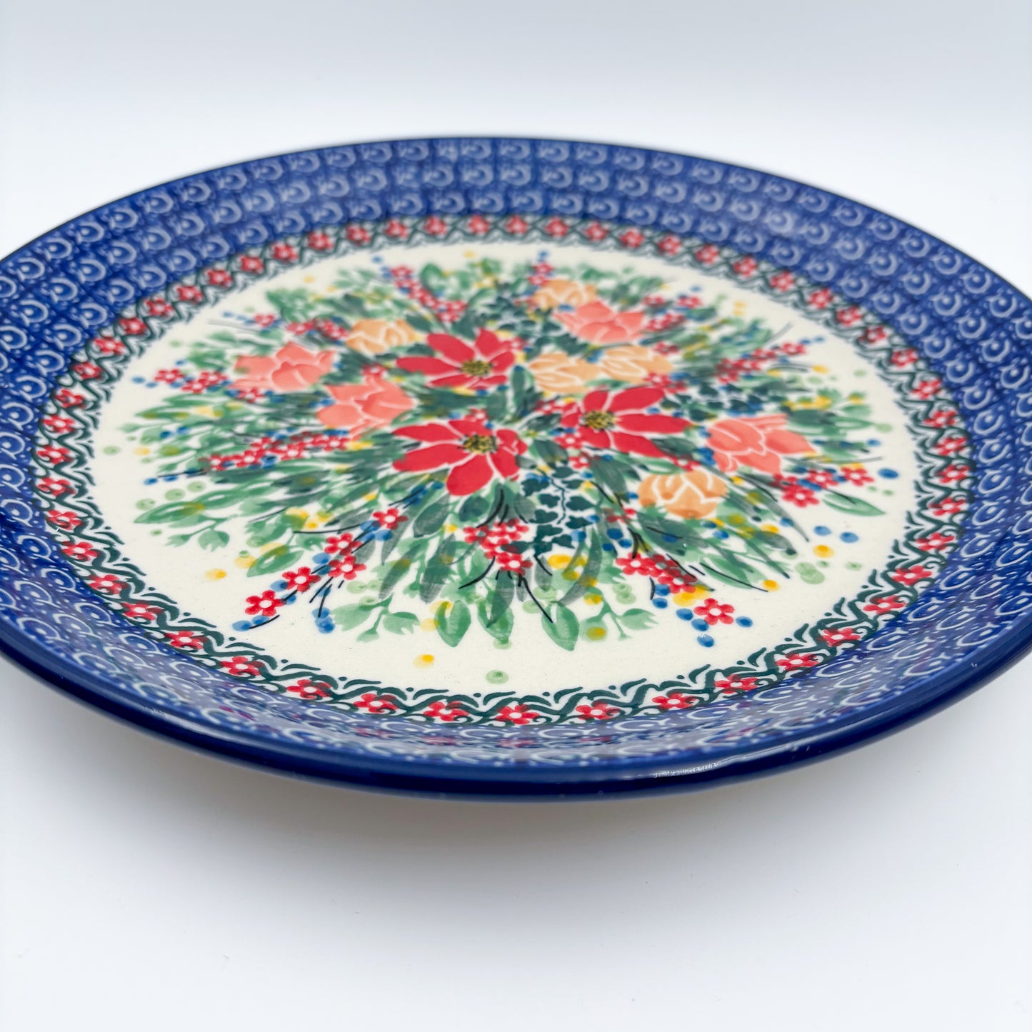 10.5” Plate.  Hand crafted Polish pottery stoneware: UNIKAT Red and Yellow Flowers Design