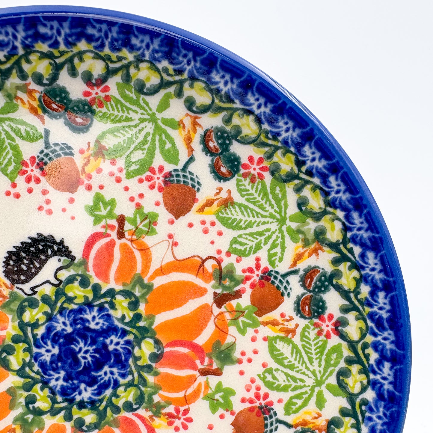 7.75” Plate.  Hand crafted Polish pottery stoneware: UNIKAT Hedgehogs and Pumpkins