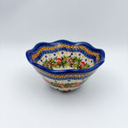 Mushroom Design scalloped bowl, front view showing mushroom and berry wreath pattern