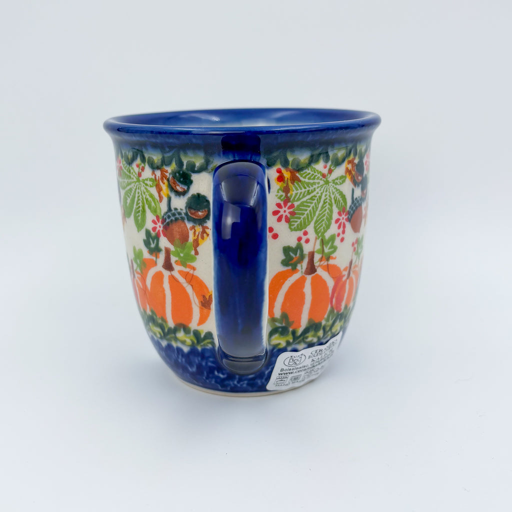 Hedgehog and Pumpkins Viking mug on white background, straight-on view with handle