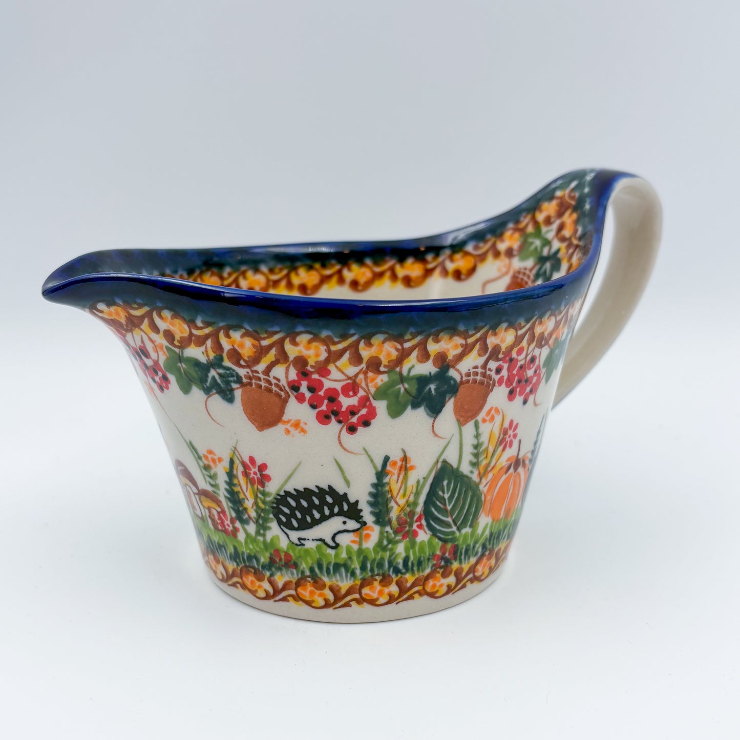 12 oz Loop Handle Gravy Boat.  Hand painted Polish pottery stoneware.  UNIKAT Hedgehog and Mushroom