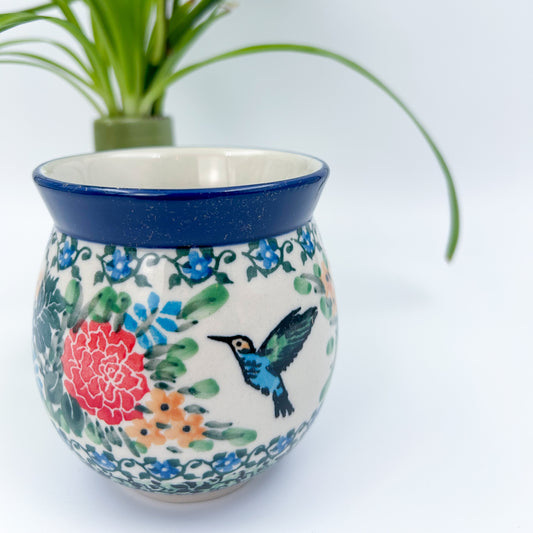 12 oz Polish Pottery floral UNIKAT bubble mug is made by talented artisans from Poland. 
Dimensions 5" x 3.66" x 3.78"
Ceramika Artystyczna Company