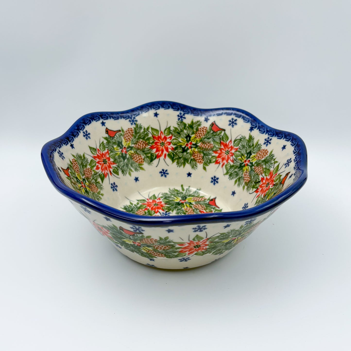 9” Wavy Bowl.  Hand crafted Polish pottery stoneware:  Christmas Cardinals