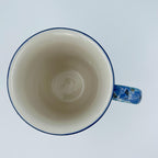 Top-down view into Rhapsody in Blue bistro mug showing cream interior
