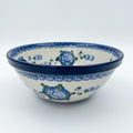 Blue Poppies stacking bowl on white background, front view