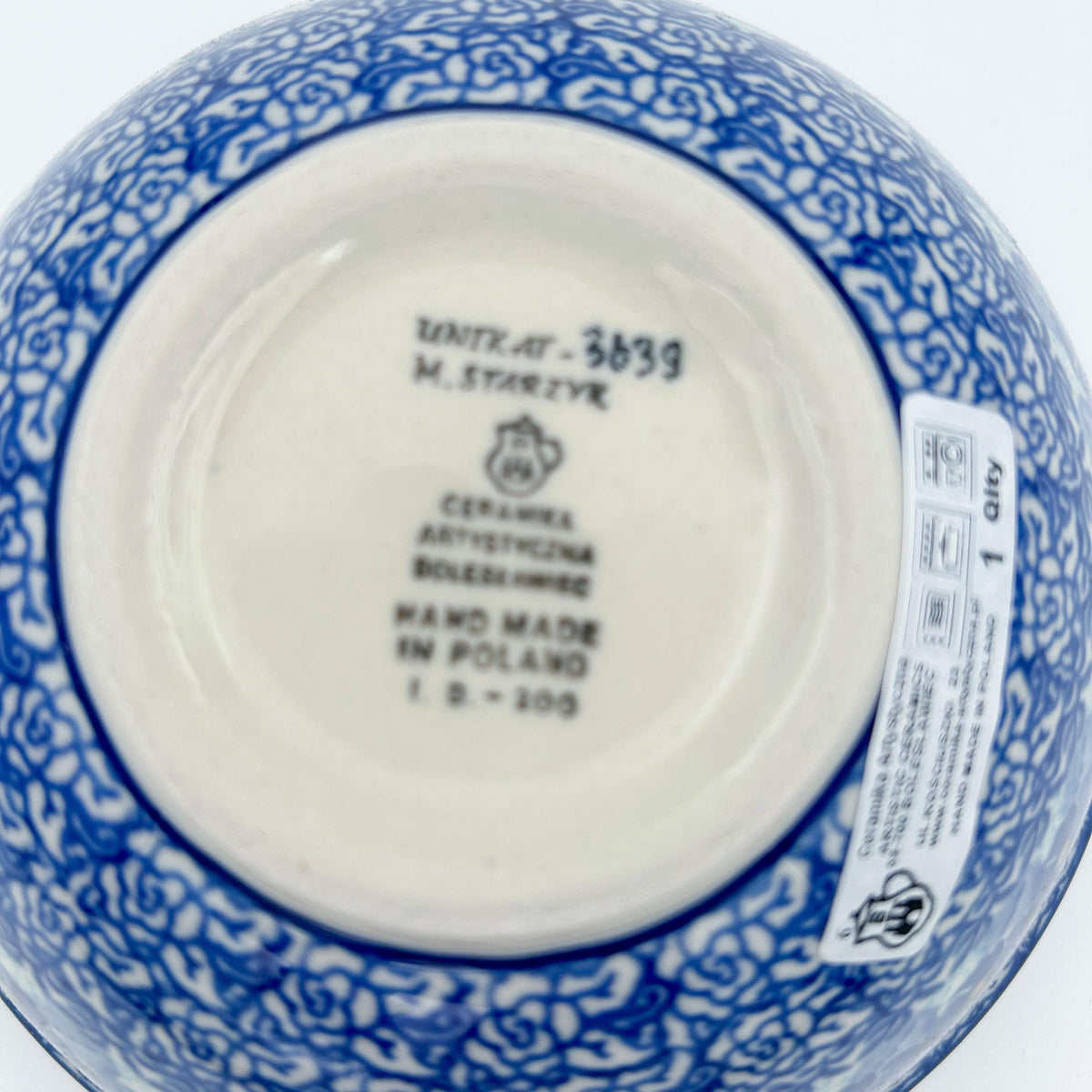 Bottom of Deep Winter stacking bowl showing Unikat stamp and artist signature