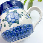16 oz blue floral Polish Pottery bubble mug is made by talented artisans from Poland.