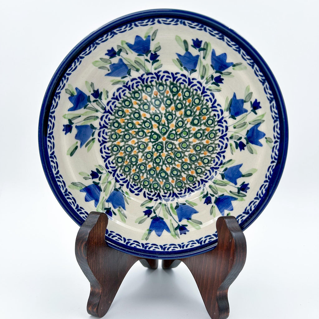 Tulip Fields bowl on display stand, top-down view