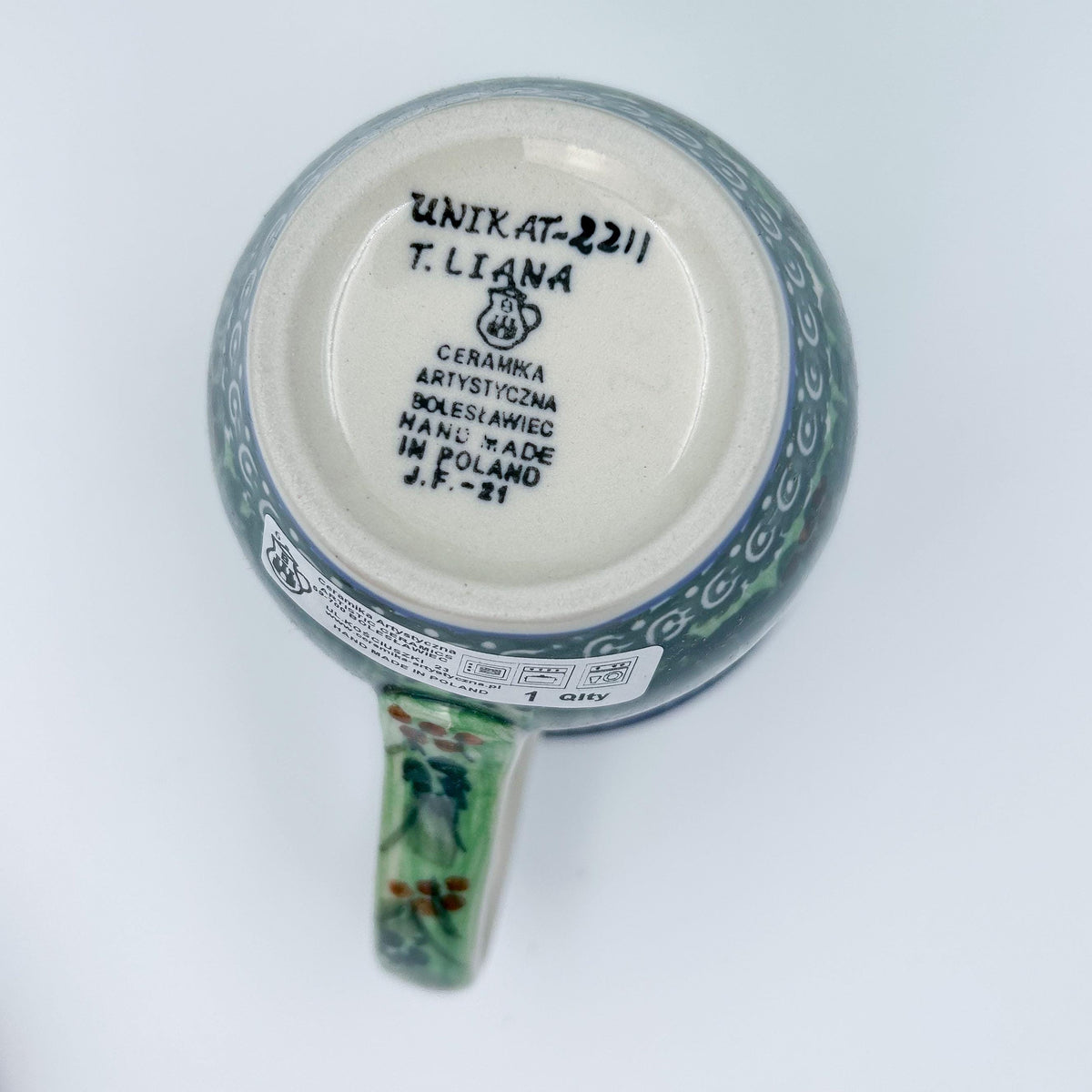 Bottom of Spring Garden bistro mug showing Unikat stamp and artist signature