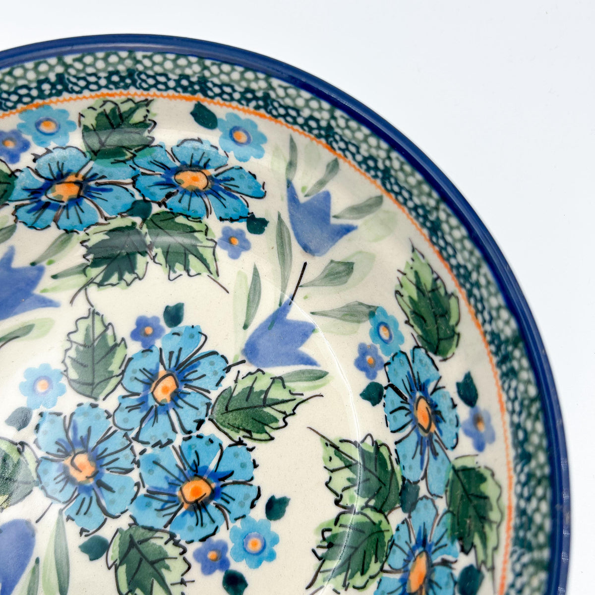 Close-up angled view of floral detail on Evangeline bowl