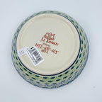 Bottom of Evangeline bowl showing Unikat stamp and artist signature M. Roman