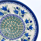 Close-up angled view of center medallion and tulip border on Tulip Fields bowl