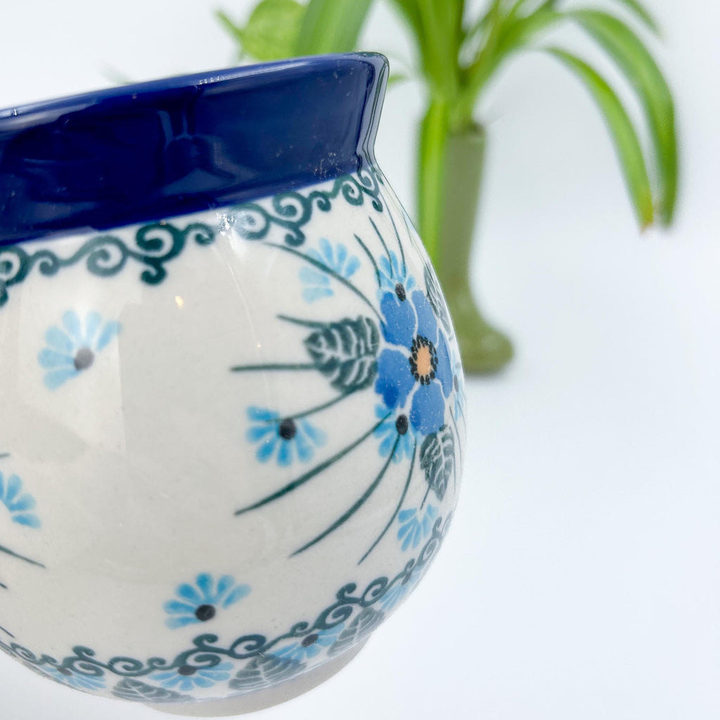 Close-up of Forget Me Not floral medallion pattern