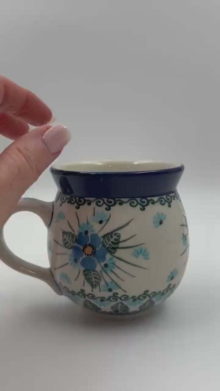This 12 oz Polish Pottery floral bubble mug is made by talented artisans from Poland. Holds 12 ounces of fluid.
Ceramika Artystyczna Company