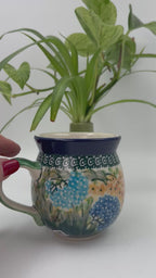 12 oz Polish Pottery bubble mug is made by talented artisans from Poland. 
This stoneware is microwave, dishwasher and oven safe as well as chip resistant.
Ceramika Artystyczna Company