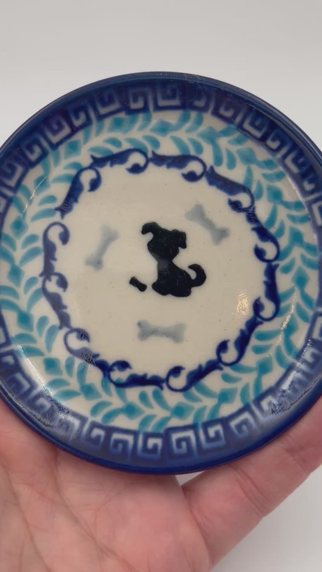4” puppy plate is a handmade by talented Polish artisans. This small roundpuppy plate is a dachshund image is simple adorable. 4" Round Ceramika Bona Company