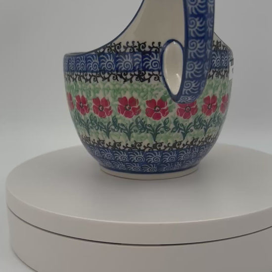 Polish pottery 16oz bowl with loop handle in the UNIKAT Candy Red Poppy pattern. It holds 16 oz of fluid.
Ceramika Artystyczna Company
