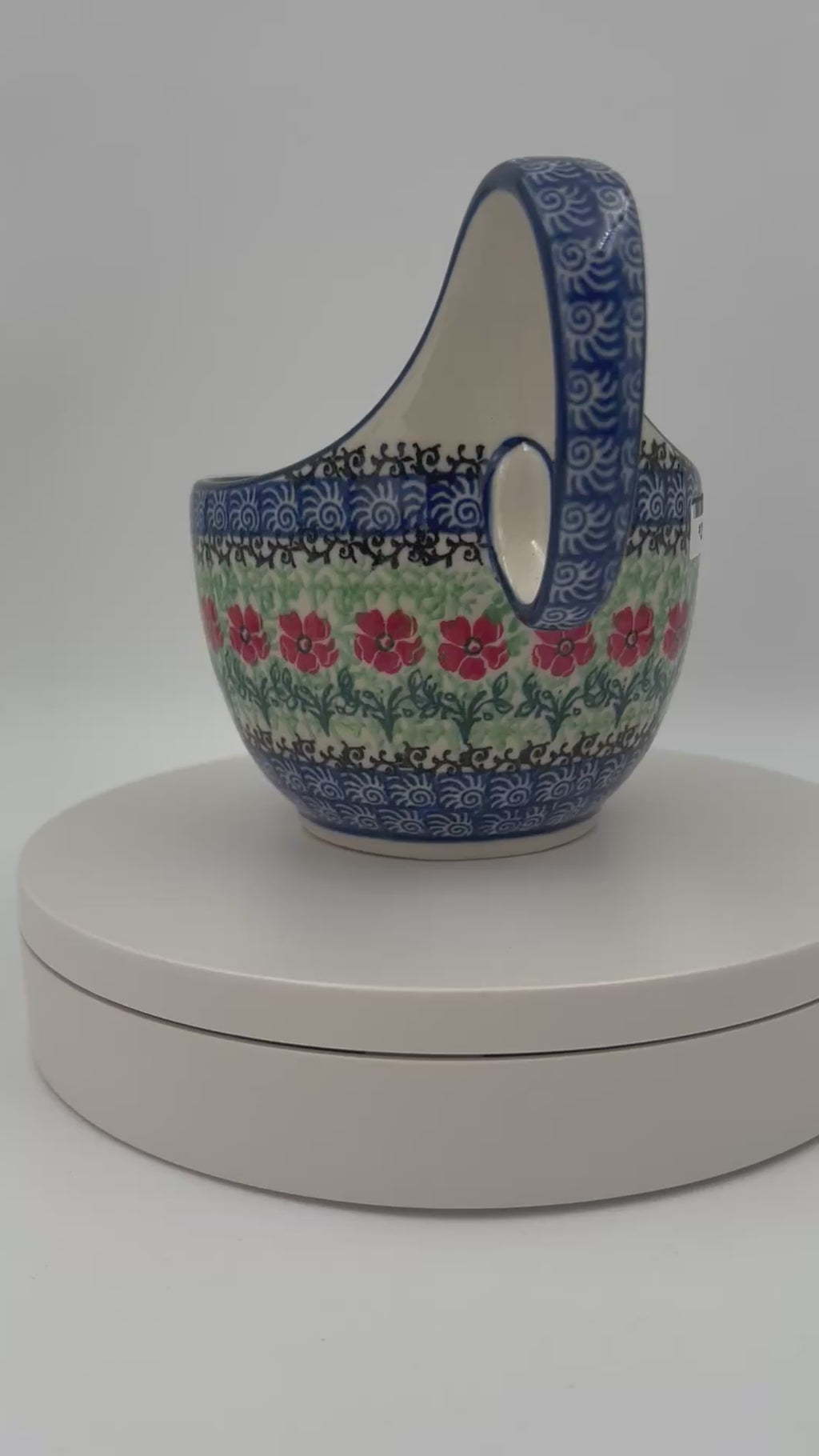Polish pottery 16oz bowl with loop handle in the UNIKAT Candy Red Poppy pattern. It holds 16 oz of fluid.
Ceramika Artystyczna Company