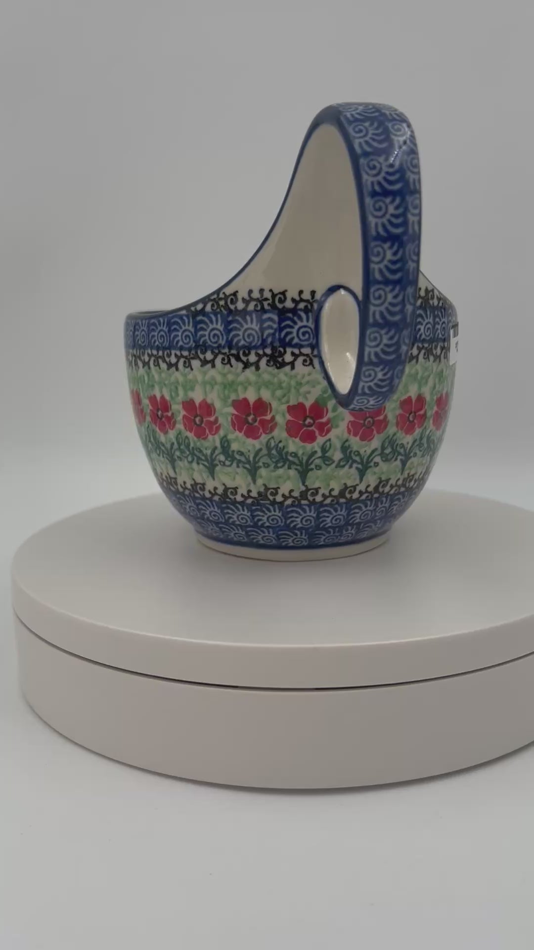 Polish pottery 16oz bowl with loop handle in the UNIKAT Candy Red Poppy pattern. It holds 16 oz of fluid.
Ceramika Artystyczna Company