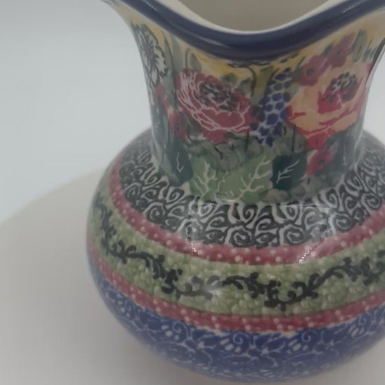 This 4” floral vase is a handmade by talented Polish artisans. This is a Polish UNIKAT signature vase.Dimensions 4.33 X 3.35 X 3.35
Ceramika Artystyczna Company