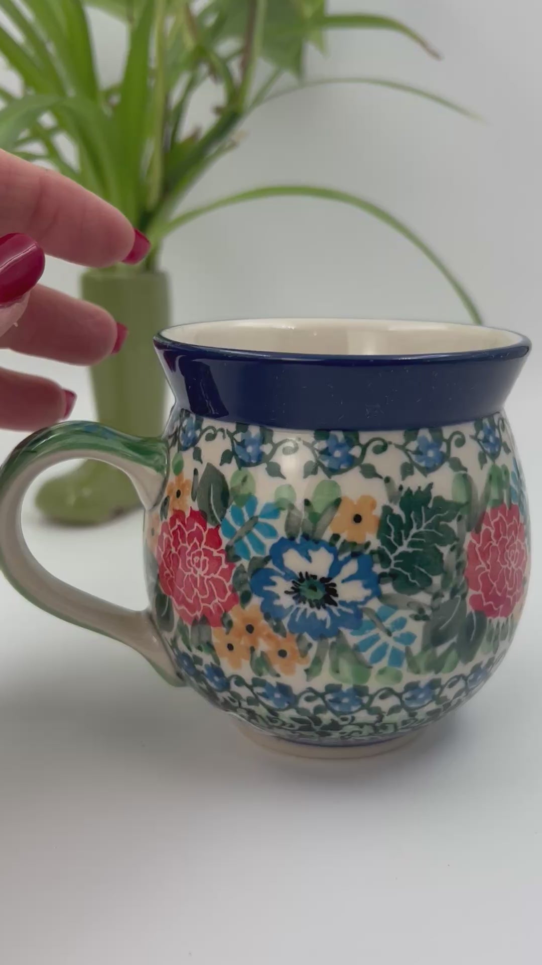 12 oz Polish Pottery floral UNIKAT bubble mug is made by talented artisans from Poland. 
Dimensions 5" x 3.66" x 3.78"
Ceramika Artystyczna Company