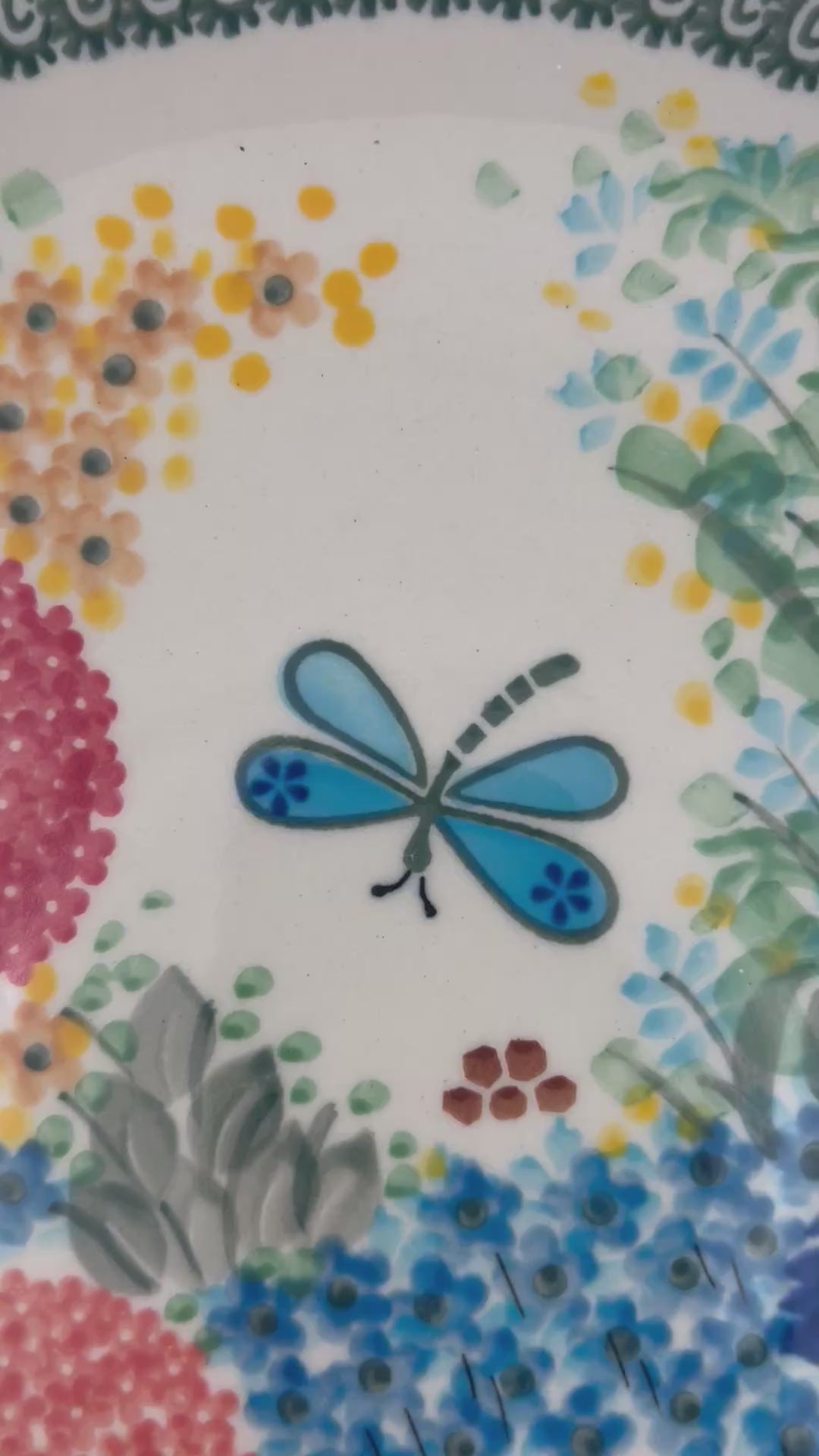 Decorative polish pottery plate with floral and butterfly.  Ceramika Artystyczna Garden Delight pattern